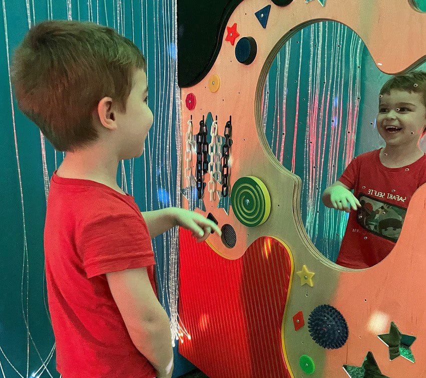 little boy in sensory room