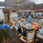 Seven care homes across Wrexham win awards for using reminiscence software