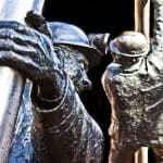 Sculpture of a steelworker and miner in Lord Street in Wrexham