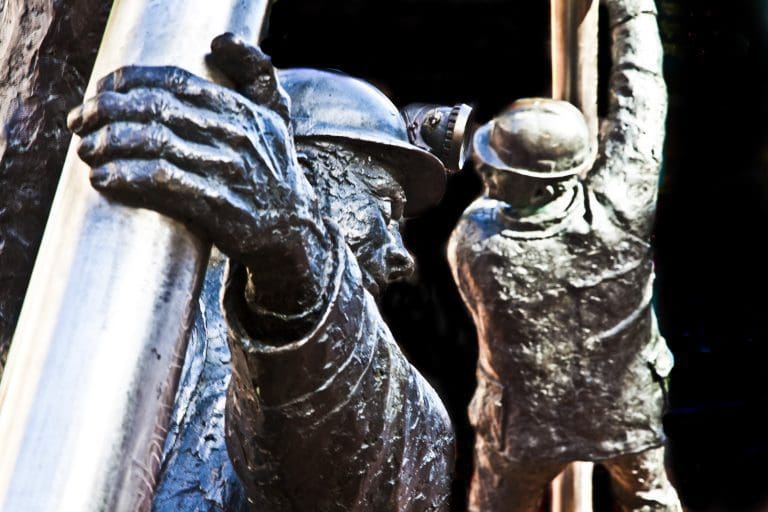 Sculpture of a steelworker and miner in Lord Street in Wrexham