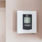 Central heating thermostat